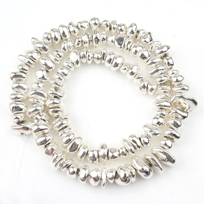 Perles naturelles en hématite de tailles irrégulières - silver